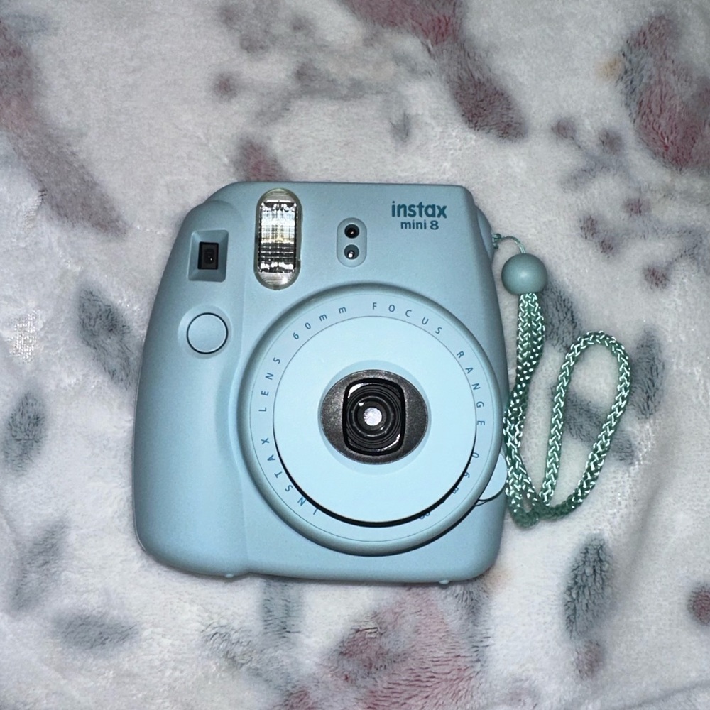 Baby blue instax mini 8 film camera with carrying case